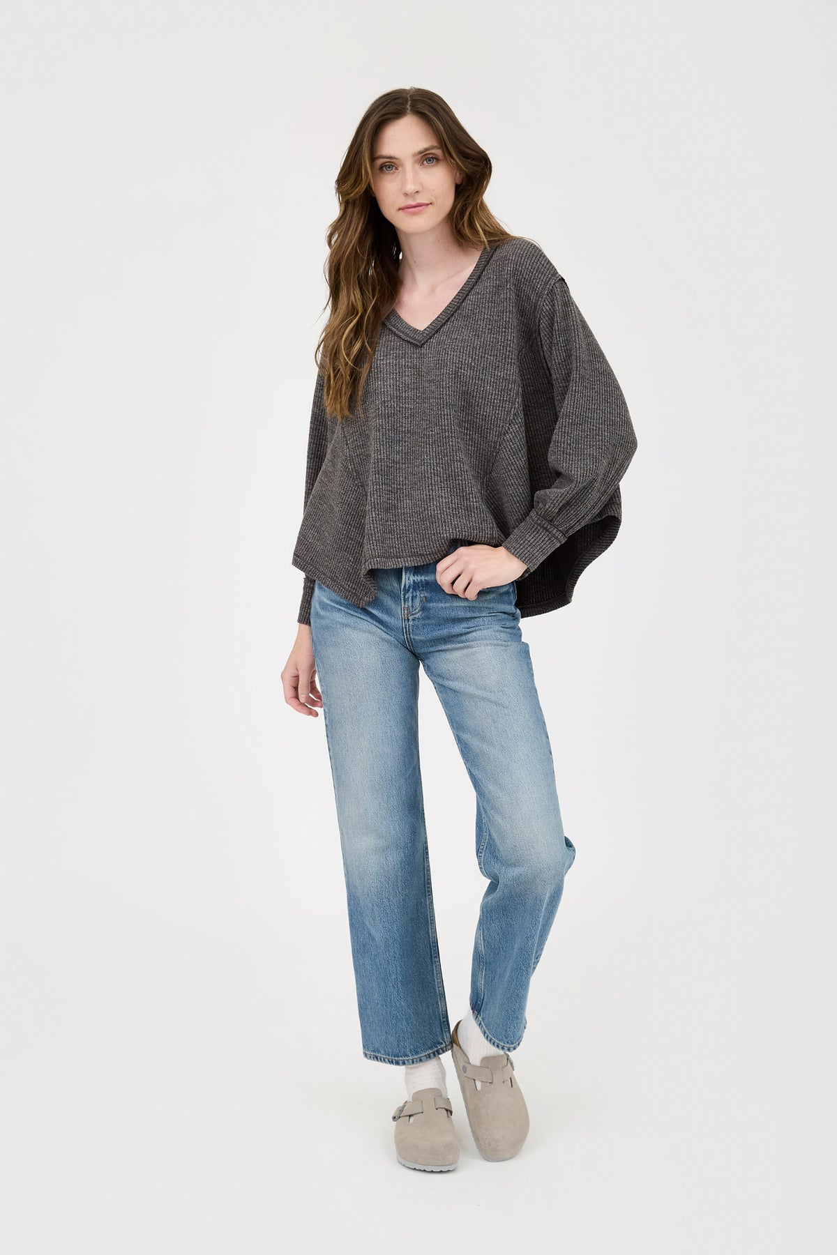 V Neck Asymmetrical Hem Long Sleeve Knit Top by Blu Pepper