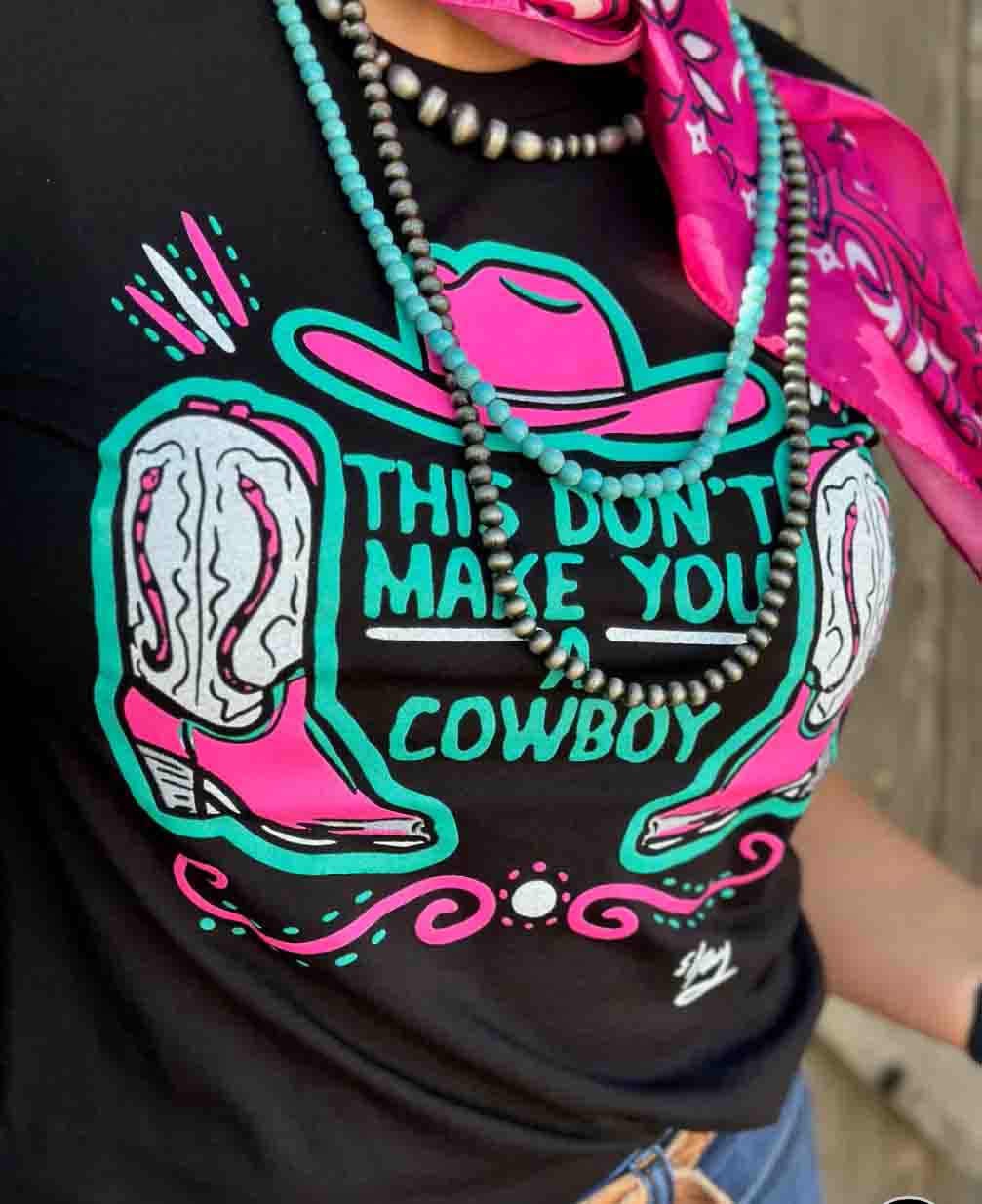 This Don't Make You a Cowboy Tee in Black by Texas True Threads